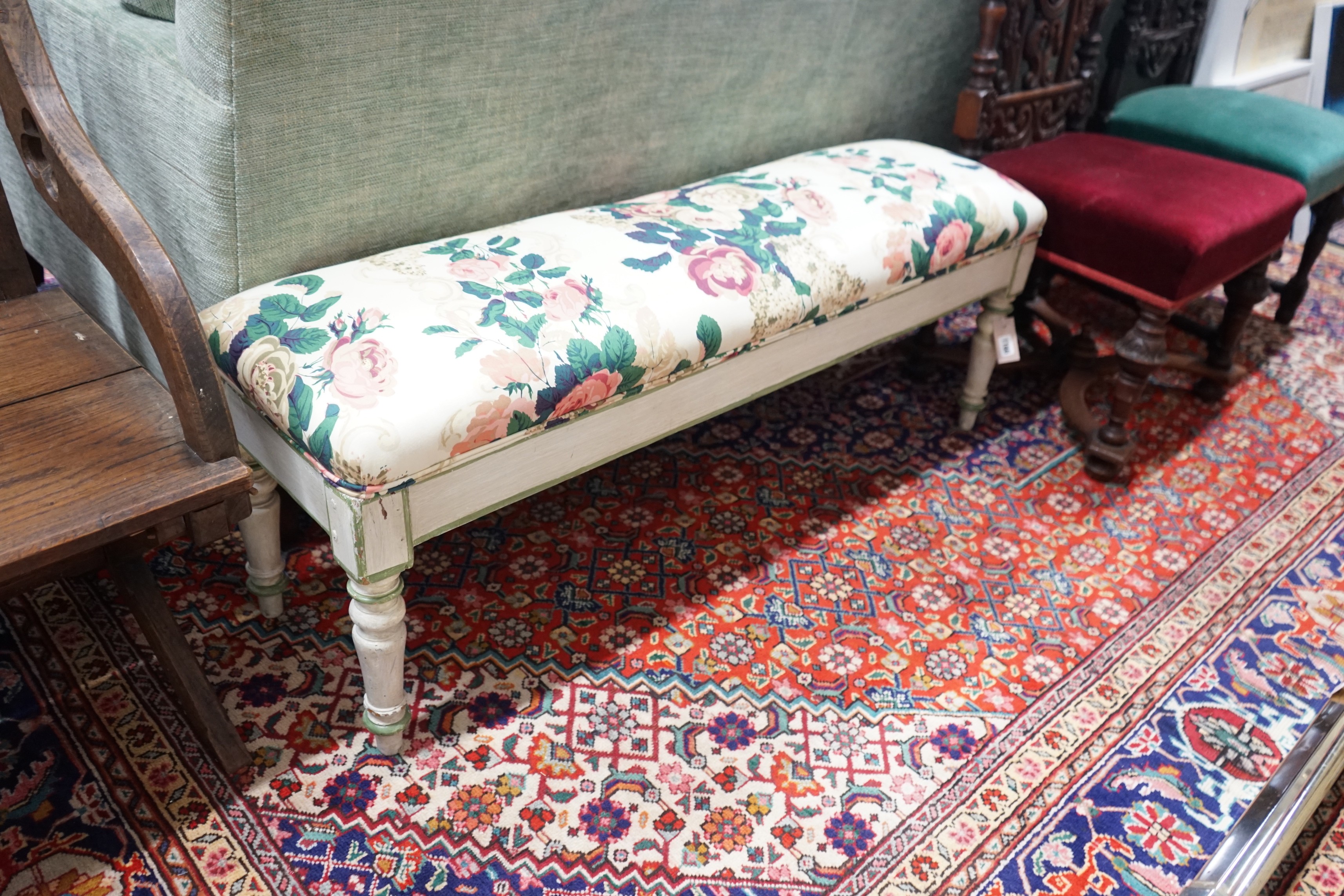 A Victorian upholstered window seat, later painted, width 120cm, depth 34cm, height 43cm